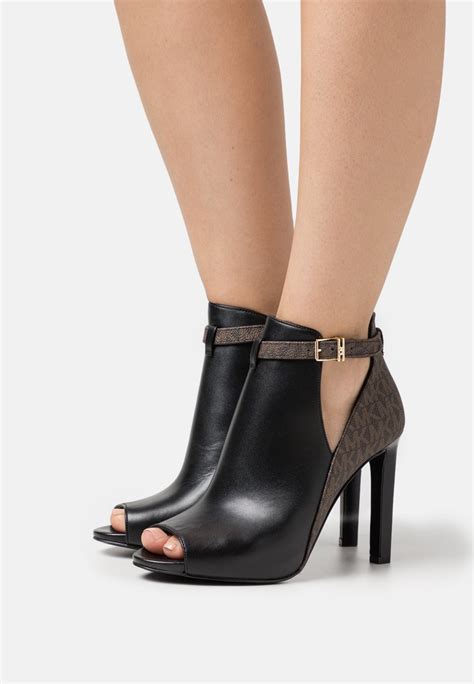 michael kors brown heel boots|Michael Kors open toe heels.